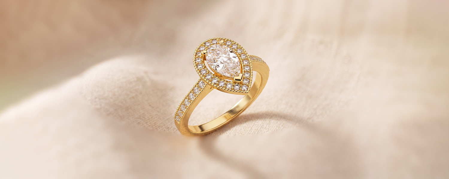 Bague de fiancailles et alliance avec diamant en taille poire - Maison Salmon